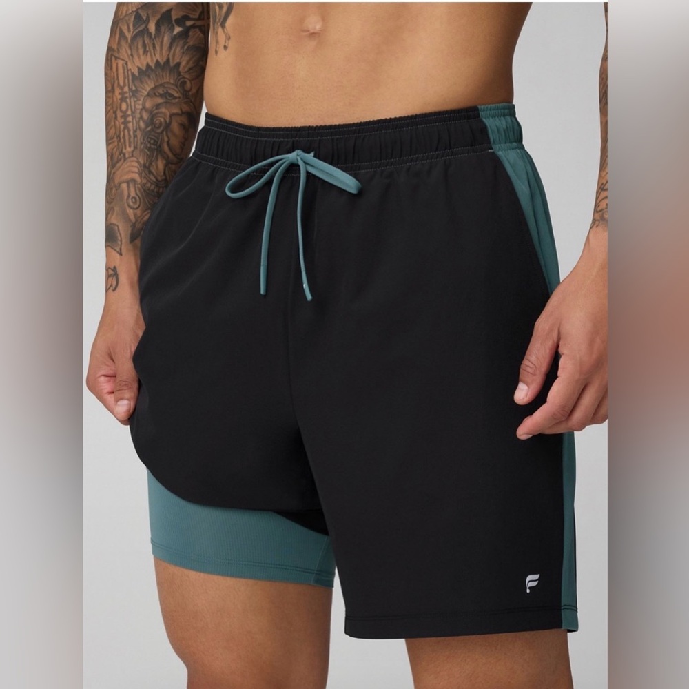 Fabletics
FLM SHORTS, THE 7" INFINITE SHORT (LINED), BLACK /STORM SLATE, XL 
NWT